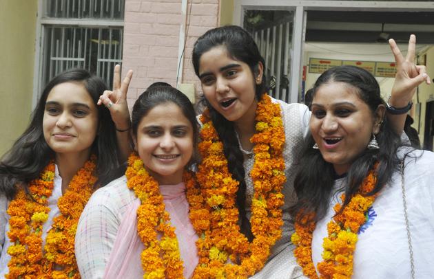 ( From left) Newly elected secretary Shalu Chokker , vice-presidentNavdeep Kaur , president Anjum Arraha and joint secretary Monika Dagar from Guru Gobind Singh College for Women in Sector 26. (Karun Sharma/HT)