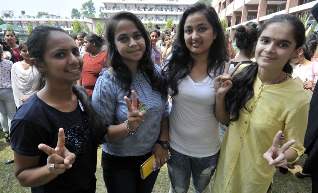(From right) President Shalini , vice-president Glady, general secretary Nancy and joint secretary Muskan in an elated mood after winning the student election in Dev Samaj College, Sector 45 in Chandigarh. (Ravi Kumar/HT)