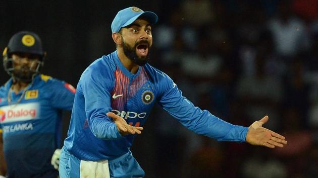 Indian cricket captain Virat Kohli (R) motivates his players to perform by a brand of captaincy that involves a relentless quest of perfection. That was evident in how the team played in all three formats against Sri Lanka cricket team. (AFP) Indian cricket captain Virat Kohli (R) motivates his players to perform by a brand of captaincy that involves a relentless quest of perfection. That was evident in how the team played in all three formats against Sri Lanka cricket team. (AFP)