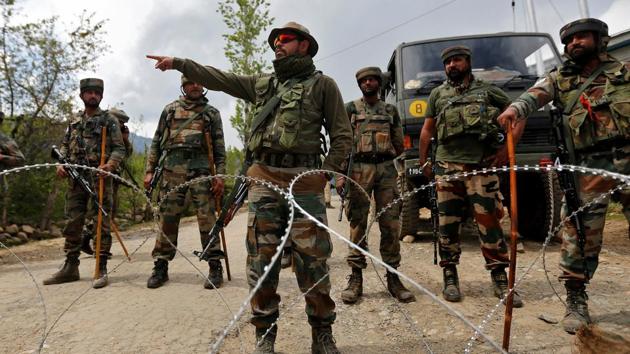 File photo of Indian Army soldiers standing guard at their base after it was attacked by militants in Kashmir's Kupwara. (Reuters) File photo of Indian Army soldiers standing guard at their base after it was attacked by militants in Kashmir's Kupwara. (Reuters)