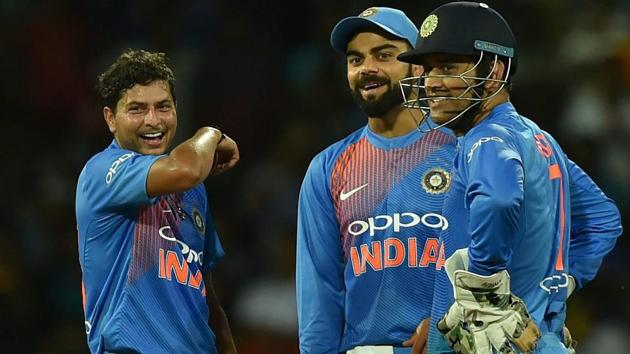 Indian cricket team’s Kuldeep Yadav (left) celebrates with Virat Kohli and MS Dhoni after taking the wicket of Sri Lanka cricket team's Dilshan Munaweera during their T20 match in Colombo on Wednesday. (PTI) Indian cricket team’s Kuldeep Yadav (left) celebrates with Virat Kohli and MS Dhoni after taking the wicket of Sri Lanka cricket team's Dilshan Munaweera during their T20 match in Colombo on Wednesday. (PTI)