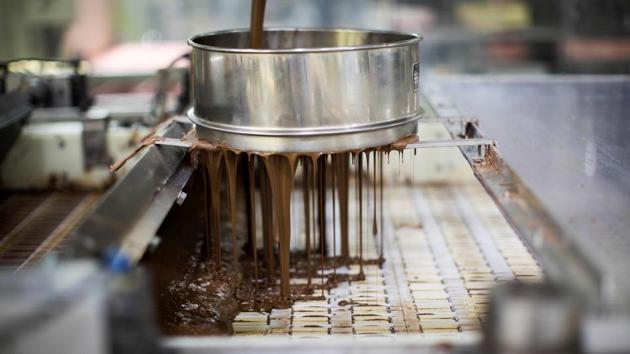 In true Japanese style, human workers are a rare sight at one KitKat factory in Kasumigaura, around 100 kilometres (60 miles) east of Tokyo. Instead, dozens of robots manufacture four million bars a day at breakneck speed, from mixing the chocolate paste to wrapping them ready for sale. (Behrouz Mehri / AFP) In true Japanese style, human workers are a rare sight at one KitKat factory in Kasumigaura, around 100 kilometres (60 miles) east of Tokyo. Instead, dozens of robots manufacture four million bars a day at breakneck speed, from mixing the chocolate paste to wrapping them ready for sale. (Behrouz Mehri / AFP)