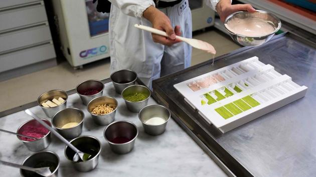 Twenty or so new versions of KitKat are unleashed on the Japanese market every year, after months of refining the flavour. ‘One third of the products is renewed every year.’ KitKat also offers customers the chance to have their chocolate elaborately gift-wrapped, get special flavours made and even have messages engraved on the bars. (Behrouz Mehri / AFP) Twenty or so new versions of KitKat are unleashed on the Japanese market every year, after months of refining the flavour. ‘One third of the products is renewed every year.’ KitKat also offers customers the chance to have their chocolate elaborately gift-wrapped, get special flavours made and even have messages engraved on the bars. (Behrouz Mehri / AFP)