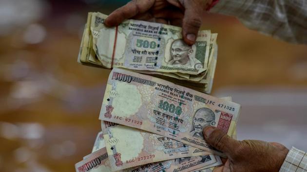 OLD IS NOT GOLD: Scrapped notes too were among the donation. (Kunal Patil/HT Photo) 