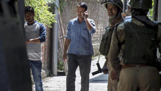 NIA officials at a house during a raid in Srinagar on Thursday. NIA today carried out searches at 10 places in Jammu and Kashmir and the NCR in connection with its probe into the funding of terror activities in the Kashmir Valley. (PTI Photo) NIA officials at a house during a raid in Srinagar on Thursday. NIA today carried out searches at 10 places in Jammu and Kashmir and the NCR in connection with its probe into the funding of terror activities in the Kashmir Valley. (PTI Photo)