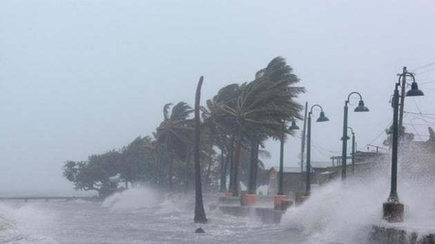 Waves crash against the seawall as Hurricane Irma slamms across islands in the northern Caribbean on Wednesday, in Fajardo, Puerto Rico. (Reuters)
