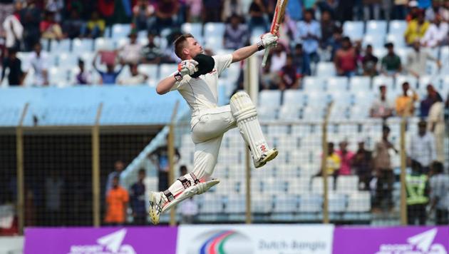 Australian cricketer David Warner reacts after scoring a century on day 3 of the second cricket Test versus Bangladesh in Chittagong on Wednesday. (AFP) Australian cricketer David Warner reacts after scoring a century on day 3 of the second cricket Test versus Bangladesh in Chittagong on Wednesday. (AFP)