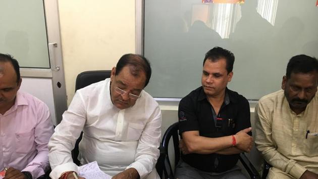 Transport minister Yashpal Arya at the public hearing event at the BJP headquarters on Thursday. (HT Photo)