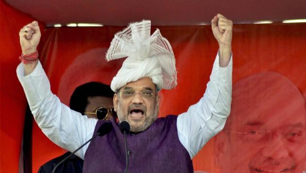 BJP president Amit Shah at a public meeting at Kumarghat in Tripura. (PTI File Photo) BJP president Amit Shah at a public meeting at Kumarghat in Tripura. (PTI File Photo)