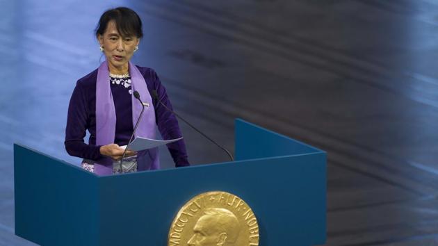 FILE- In this Saturday, June 16, 2012 file photo, Myanmar opposition leader Aung San Suu Kyi, holds her speech during the Peace Nobel Prize lecture at the city hall in Oslo as she formally accepts the prize she won while under house arrest in 1991. The organization that oversees the Nobel Peace Prize said Friday, Sept. 8, 2017, the 1991 prize awarded to Myanmar's Aung Sang Suu Kyi cannot be revoked. (AP) FILE- In this Saturday, June 16, 2012 file photo, Myanmar opposition leader Aung San Suu Kyi, holds her speech during the Peace Nobel Prize lecture at the city hall in Oslo as she formally accepts the prize she won while under house arrest in 1991. The organization that oversees the Nobel Peace Prize said Friday, Sept. 8, 2017, the 1991 prize awarded to Myanmar's Aung Sang Suu Kyi cannot be revoked. (AP)
