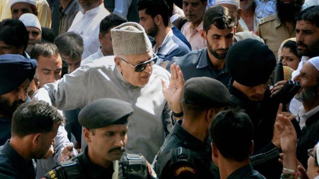 Member Parliament and National Conference president Farooq Abdullah interacts with party supporters after offering special prayers at the graveyard of his father and founder of National Conference Sheikh Abdullah on his 35th death anniversary, in Srinagar on Friday. (PTI Photo) Member Parliament and National Conference president Farooq Abdullah interacts with party supporters after offering special prayers at the graveyard of his father and founder of National Conference Sheikh Abdullah on his 35th death anniversary, in Srinagar on Friday. (PTI Photo)