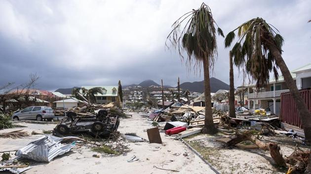 Winds dipped on Thursday to 175 mph as the Irma soaked the northern coasts of the Dominican Republic and Haiti and brought hurricane-force wind to the Turks and Caicos Islands. However it still remains a Category 5 storm, the highest designation by the National Hurricane Center (NHC). (Lionel Chamoseau / AFP) 