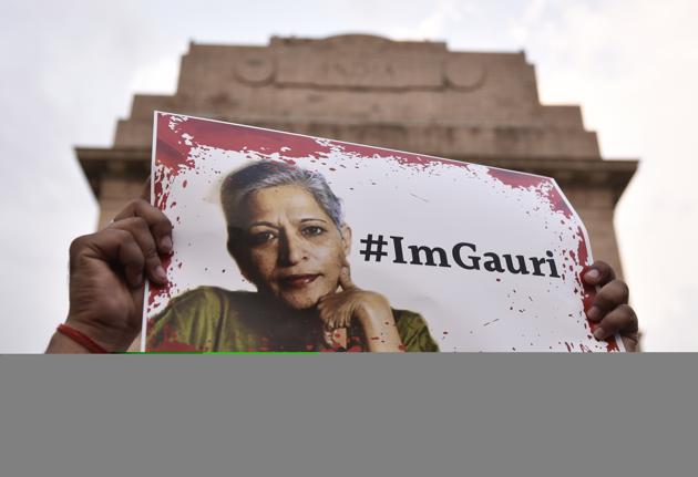A candle light vigil was organised for the journalist Gauri Lankesh who was murdered in Bengaluru. (Burhaan Kinu/HT File Photo) A candle light vigil was organised for the journalist Gauri Lankesh who was murdered in Bengaluru. (Burhaan Kinu/HT File Photo)
