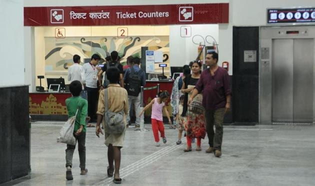 Enthusiastic passengers thronged the ticket counters at Shringar Nagar Metro station since morning.(Subhankar Chakraborty/HT PHOTO)