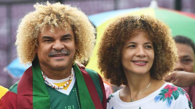 Carlos Valderrama, who played in three World Cup tournaments, poses for pictures with his wife Elvira. (AFP) Carlos Valderrama, who played in three World Cup tournaments, poses for pictures with his wife Elvira. (AFP)
