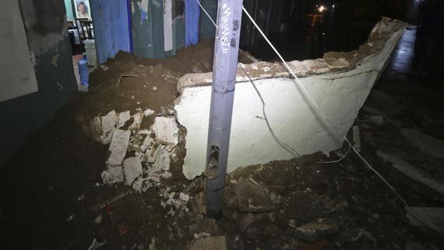 The quake triggered small tsunami waves while a number of buildings suffered severe damage in parts of southern Mexico. Some of the worst initial reports came from Juchitan in Oaxaca state, where sections of the town hall, a hotel, a bar and other buildings were reduced to rubble. (Luis Alberto Cruz / AP) The quake triggered small tsunami waves while a number of buildings suffered severe damage in parts of southern Mexico. Some of the worst initial reports came from Juchitan in Oaxaca state, where sections of the town hall, a hotel, a bar and other buildings were reduced to rubble. (Luis Alberto Cruz / AP)