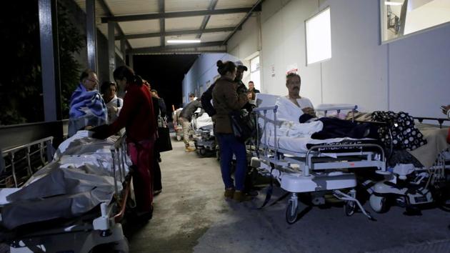 Patients and family members are seen outside the Institute for Social Security and Services for State Workers (ISSSTE) after an earthquake struck off the southern coast of Mexico late on Thursday in Puebla, Mexico. (Imelda Medina / REUTERS) Patients and family members are seen outside the Institute for Social Security and Services for State Workers (ISSSTE) after an earthquake struck off the southern coast of Mexico late on Thursday in Puebla, Mexico. (Imelda Medina / REUTERS)