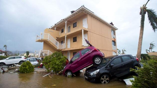 France, the Netherlands and Britain sent water, emergency rations and rescue teams to stricken territories in the Caribbean. The worst-affected island so far is Saint Martin, which is divided between the Netherlands and France. ‘It is an enormous disaster. 95% of the island is destroyed. I am in shock,’ Daniel Gibbs, chairman of a local council on Saint Martin, told Radio Caribbean International. (Lionel  Chamoiseau / AFP) 