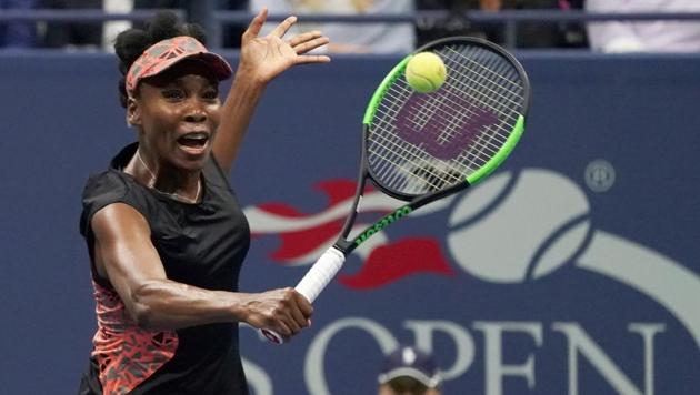 Venus Williams hits a return to Sloane Stephens during their US Open Women's Singles semi-final match.(AFP)