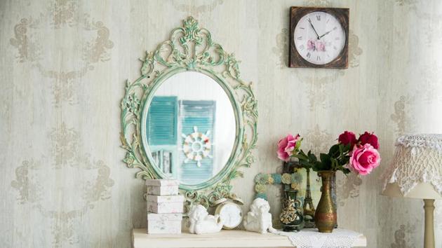 Decorative or antique mirrors can help create the illusion of spaciousness in a small apartment. (Shutterstock) Decorative or antique mirrors can help create the illusion of spaciousness in a small apartment. (Shutterstock)