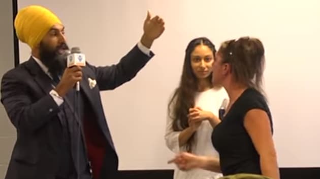 The woman stormed off after Jagmeet Singh kept saying “we will not be intimidated by hate”.(Video screengrab)