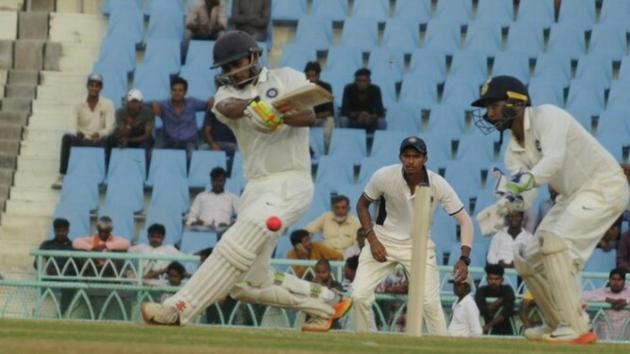 India Red’s Priyank Panchal plays a sweep shot for a boundary in the Duleep Trophy on Saturday in Lucknow.(HT Photo)