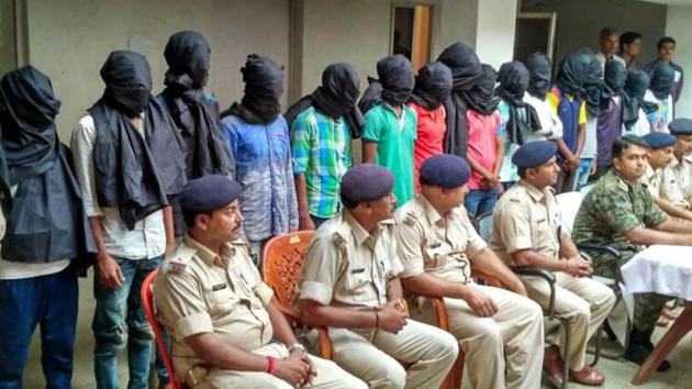 Arrested gang-rape accused standing in a row in Dumka(HT Photo)