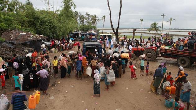 Rohingya refugees arrive in Bangladesh at Shah Porir Dwip in Teknaf on September 9.(AFP Photo) Rohingya refugees arrive in Bangladesh at Shah Porir Dwip in Teknaf on September 9.(AFP Photo)