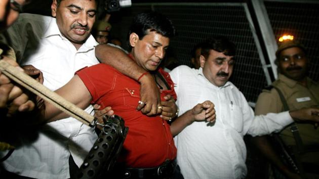 An Indian court on September 9, sentenced Abu Salem (red shirt) to life imprisonment over bomb blasts in Mumbai. (Manpreet Romana / AFP File Photo) An Indian court on September 9, sentenced Abu Salem (red shirt) to life imprisonment over bomb blasts in Mumbai. (Manpreet Romana / AFP File Photo)