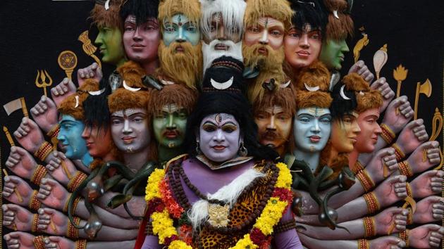 An Indian ‘Theyyam’ artist performing during the ‘Kummati Kali’ as part of the annual Onam festival celebrations in Thrissur district of Kerala. The Theyyam worship rituals are part of several thousand year-old traditions and customs of Kerala. (Arun Sankar / AFP) An Indian ‘Theyyam’ artist performing during the ‘Kummati Kali’ as part of the annual Onam festival celebrations in Thrissur district of Kerala. The Theyyam worship rituals are part of several thousand year-old traditions and customs of Kerala. (Arun Sankar / AFP)