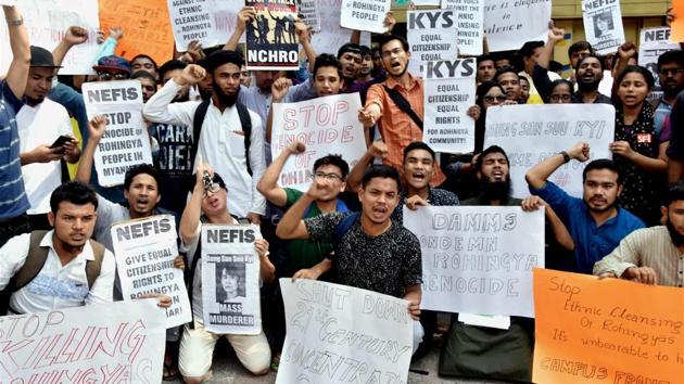 Myanmar students protest against alleged atrocities faced by Rohingya Muslims in Myanmar, outside the Myanmar Embassy in New Delhi on Saturday.(PTI)