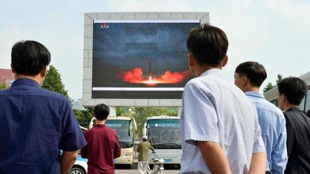 North Koreans watch a news report showing the country’s Hwasong-12 ballistic missile launch in Pyongyang. (Kyodo via REUTERS) North Koreans watch a news report showing the country’s Hwasong-12 ballistic missile launch in Pyongyang. (Kyodo via REUTERS)
