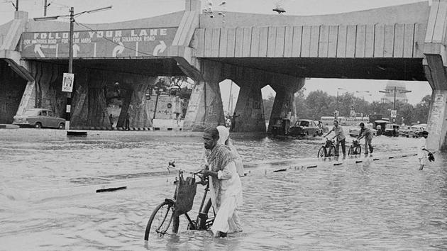 A scene from June 1977 in Delhi. Right now, what Delhi needs is a push from atmospheric conditions such as a cyclonic circulation, a trough or a low-pressure area, according to weather experts. (SN Sinha / HT Photo) A scene from June 1977 in Delhi. Right now, what Delhi needs is a push from atmospheric conditions such as a cyclonic circulation, a trough or a low-pressure area, according to weather experts. (SN Sinha / HT Photo)