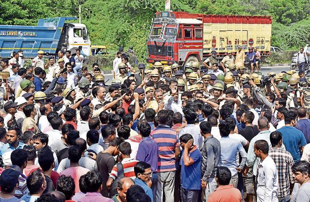People gather outside the Ryan International School on Saturday. (Sanjeev Verma/HT PHOTO) People gather outside the Ryan International School on Saturday. (Sanjeev Verma/HT PHOTO)