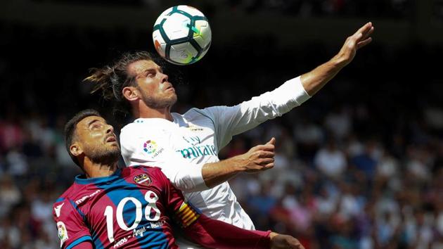 Levante’s Pedro Lopez in action with Real Madrid’s Gareth Bale during their La Liga encounter. (REUTERS) Levante’s Pedro Lopez in action with Real Madrid’s Gareth Bale during their La Liga encounter. (REUTERS)