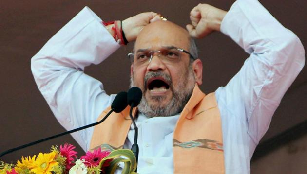 Bhubaneswar: BJP President Amit Shah addressing party workers during the party workers' conference in Bhubaneswar on Friday. PTI Photo(PTI9_8_2017_000078B) (PTI) Bhubaneswar: BJP President Amit Shah addressing party workers during the party workers' conference in Bhubaneswar on Friday. PTI Photo(PTI9_8_2017_000078B) (PTI)