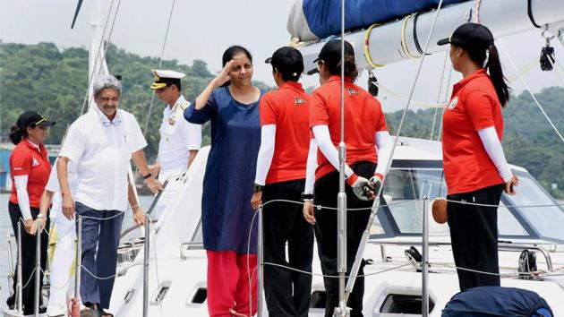 Defence minister Nirmala Sitharaman flagging off INSV Tarini, a ship that will circumnavigate the globe, in the presence of Goa chief minister Manohar Parrikar near Panaji in Goa on Sunday.(PTI)