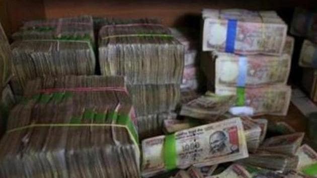 In its annual report for 2016-17 released on August 30, the RBI had said Rs 15.28 lakh crore, or 99% of the demonetised Rs 500 and Rs 1,000 notes, have returned to the banking system. (AP File Photo) In its annual report for 2016-17 released on August 30, the RBI had said Rs 15.28 lakh crore, or 99% of the demonetised Rs 500 and Rs 1,000 notes, have returned to the banking system. (AP File Photo)