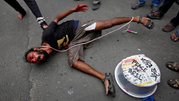 A demonstrator performs in a street play during a protest rally against what the protesters say are killings of Rohingya people in Myanmar, near Myanmar consulate in Kolkata, India, September 4, 2017. (Rupak De Chowdhuri / REUTERS) A demonstrator performs in a street play during a protest rally against what the protesters say are killings of Rohingya people in Myanmar, near Myanmar consulate in Kolkata, India, September 4, 2017. (Rupak De Chowdhuri / REUTERS)