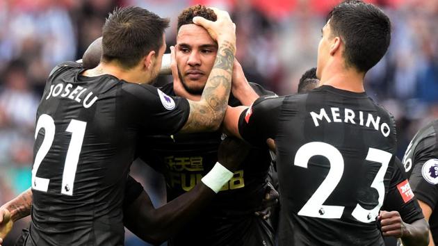 Newcastle United’s Jamaal Lascelles celebrates scoring their first goal with teammates.(REUTERS)