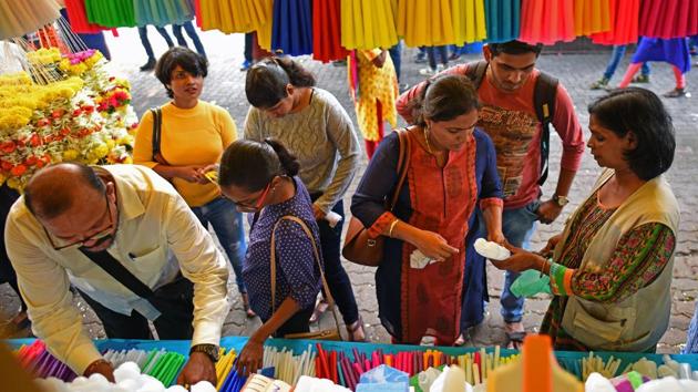 Shops and kiosks running on either sides of the fair varied from Rajasthani pickles to Goan sweets to souvenirs and mementos of Jesus and Mary. (Satyabrata Tripathy/Hindustan Times) 