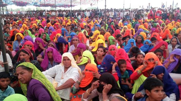 People take part in a meeting to decide on alcohol ban, in Bharatpur on Sunday. (HT Photo) People take part in a meeting to decide on alcohol ban, in Bharatpur on Sunday. (HT Photo)