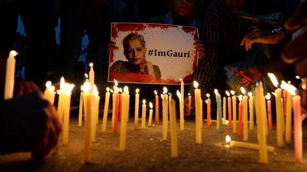 Indian activists take part in a protest rally against the killing of Indian journalist Gauri Lankesh at the India Gate memorial in New Delhi on September 6, 2017. (Sajjad Hussain / sAFP) Indian activists take part in a protest rally against the killing of Indian journalist Gauri Lankesh at the India Gate memorial in New Delhi on September 6, 2017. (Sajjad Hussain / sAFP)