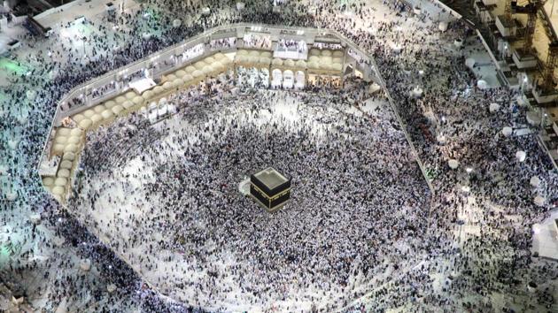 An aerial view shows Muslim pilgrims circumambulating the Kaaba, Islam's holiest shrine, at the Grand Mosque in Saudi Arabia's holy city of Mecca. (Bandar Aldandani / AFP) An aerial view shows Muslim pilgrims circumambulating the Kaaba, Islam's holiest shrine, at the Grand Mosque in Saudi Arabia's holy city of Mecca. (Bandar Aldandani / AFP)