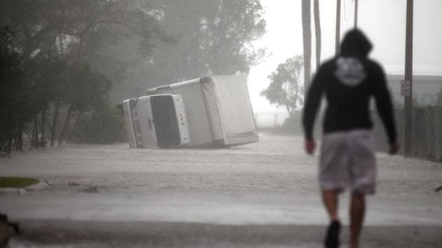 A truck is seen turned over as Hurricane Irma passes south Florida, in Miami, Monday. (Reuters Photo) A truck is seen turned over as Hurricane Irma passes south Florida, in Miami, Monday. (Reuters Photo)
