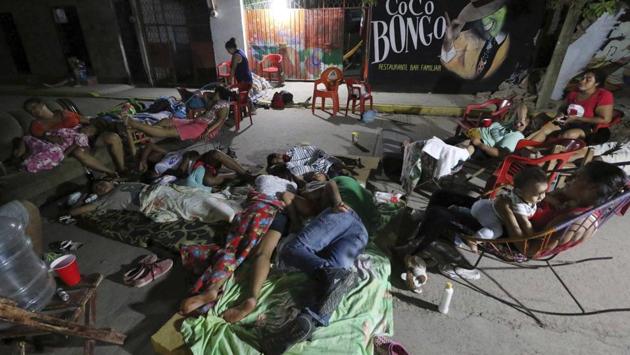 Residents in many areas slept on the streets fearful of more collapses as strong aftershocks continued, including a magnitude 5.2 jolt early Sunday in the aftermath of the earthquake which toppled hundreds of buildings in several states. Hardest-hit was Juchitan, where a third of the city's homes collapsed or were uninhabitable. Some tremors prompted rescue workers to pause in their labour. (Luis Alberto Cruz / AP) Residents in many areas slept on the streets fearful of more collapses as strong aftershocks continued, including a magnitude 5.2 jolt early Sunday in the aftermath of the earthquake which toppled hundreds of buildings in several states. Hardest-hit was Juchitan, where a third of the city's homes collapsed or were uninhabitable. Some tremors prompted rescue workers to pause in their labour. (Luis Alberto Cruz / AP)