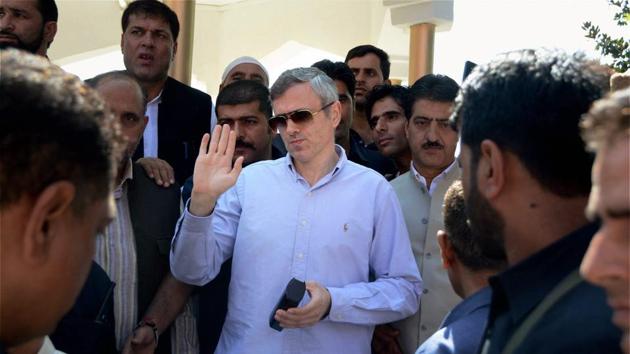 Former chief minister and National Conference working president Omar Abdullah interacts with party supporters after offering special prayers at the graveyard of his grandfather and National Conference founder,in Srinagar.(PTI FILE PHOTO)