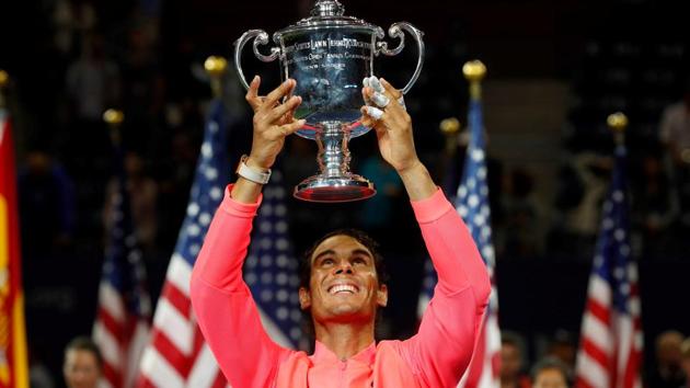 Rafael Nadal holds the US Open men’s singles trophy after defeating Kevin Anderson on Sunday(REUTERS)