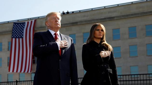 US President Donald Trump and First Lady Melania Trump attend the 9/11 observance at the National 9/11 Pentagon Memorial in Arlington, Virginia, US. (REUTERS) US President Donald Trump and First Lady Melania Trump attend the 9/11 observance at the National 9/11 Pentagon Memorial in Arlington, Virginia, US. (REUTERS)