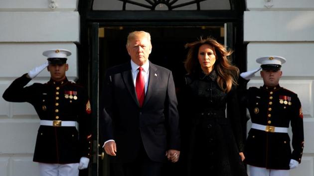 US President Donald Trump and first lady Melania Trump arrive to observe a moment of silence in remembrance of those lost in the 9/11 attacks at the White House in Washington. (REUTERS) US President Donald Trump and first lady Melania Trump arrive to observe a moment of silence in remembrance of those lost in the 9/11 attacks at the White House in Washington. (REUTERS)